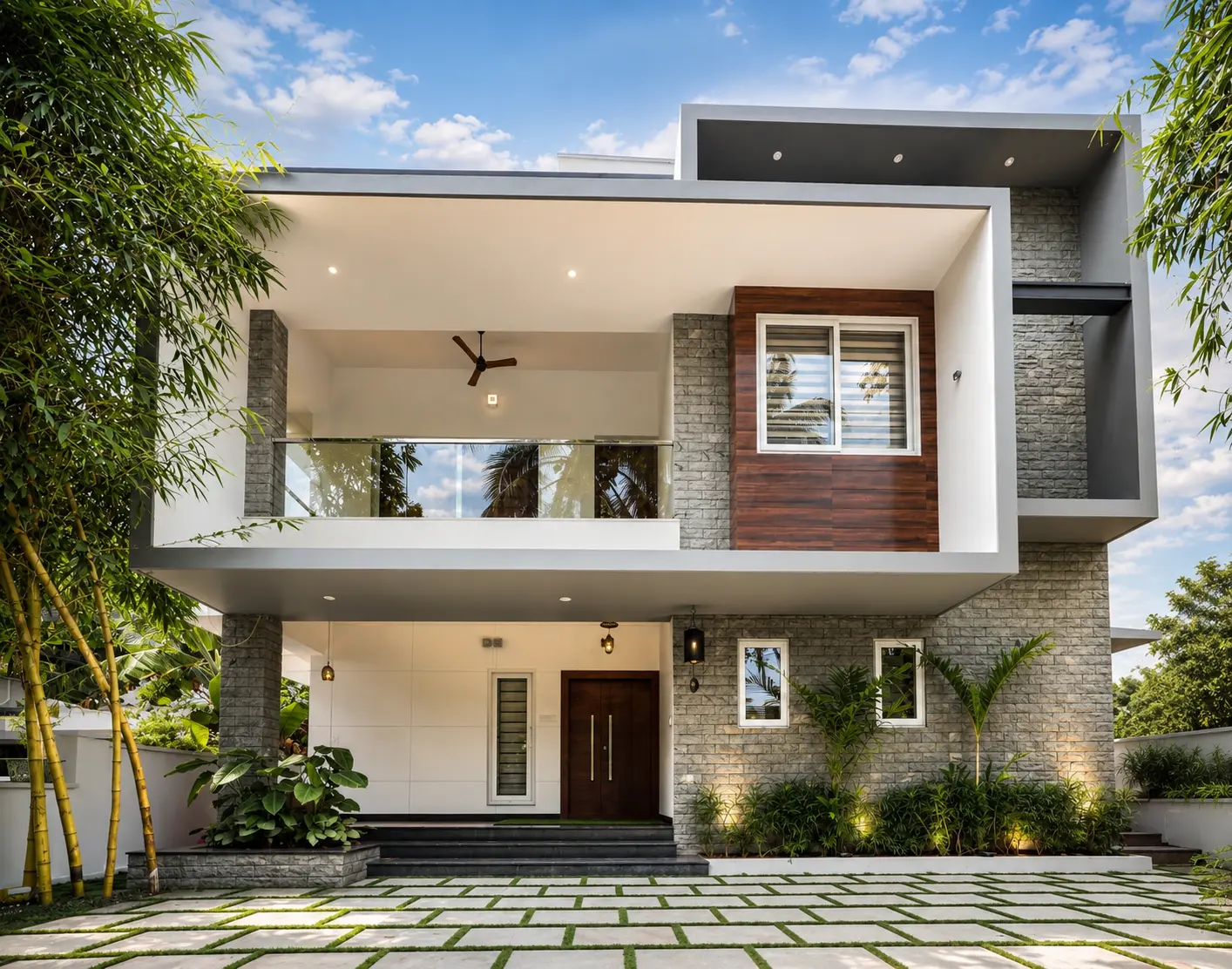 Modern villa with stone cladding and cantilevered balcony — Exterior work by Alpha Design Studio