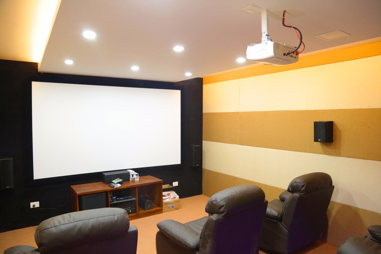 Private home theatre with acoustic panelling — Interior work by Alpha Design Studio