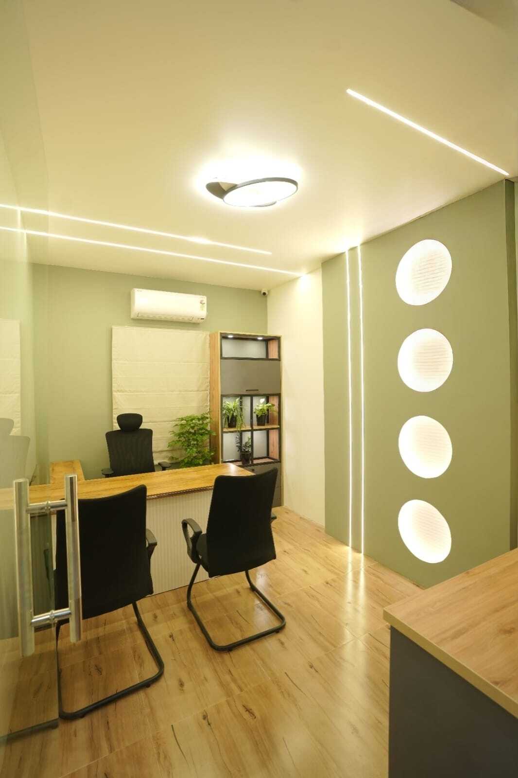 COO cabin with green walls and circular lighting